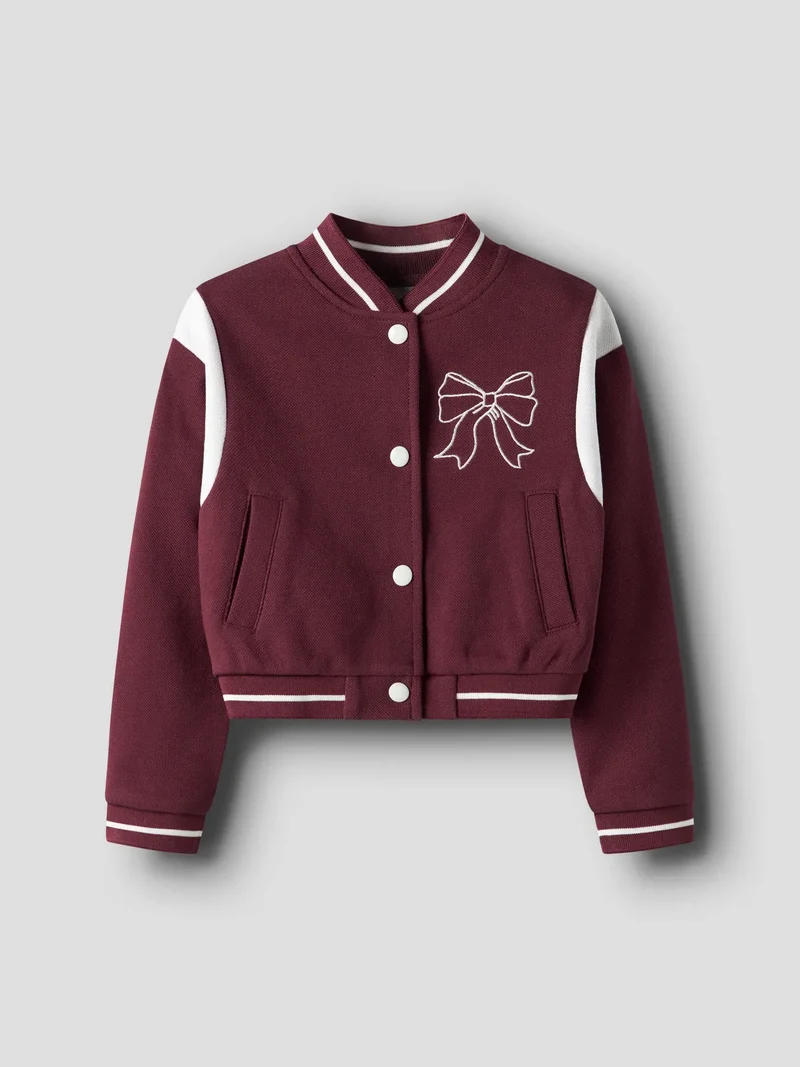 Cardigan med rosett